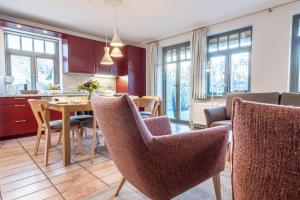 Köök või kööginurk majutusasutuses Ferienhaussiedlung Strandperlen Buchenhof 2a (Typ VIII)