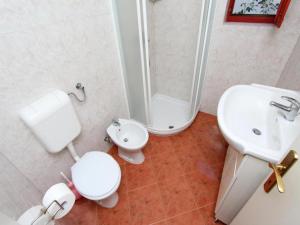 Koupelna v ubytování Apartments Frane