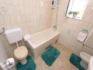 Koupelna v ubytování Apartments Frane