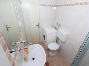 Koupelna v ubytování Apartments Frane