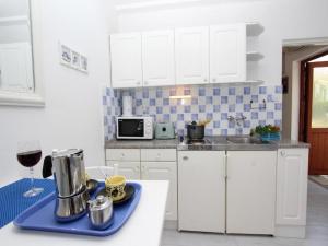 Kuchyň nebo kuchyňský kout v ubytování Apartments Frane