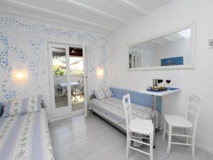 Postel nebo postele na pokoji v ubytování Apartments Frane