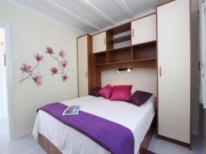 Postel nebo postele na pokoji v ubytování Apartments Frane