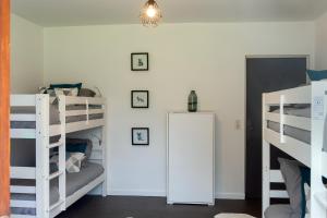 Łóżko lub łóżka w pokoju w obiekcie Maison de vacances avec piscine