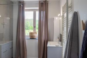 Łazienka w obiekcie Maison de vacances avec piscine