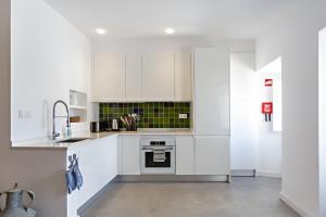 Kuchyň nebo kuchyňský kout v ubytování Casa da Tavira