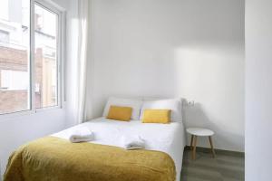 Ein Bett oder Betten in einem Zimmer der Unterkunft Very nice and modern flat, in Alicante Center