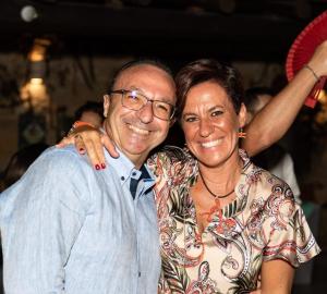 a man and a woman posing for a picture at La Rosa Rossa in Sciacca
