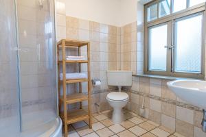 Koupelna v ubytování Ferienhaussiedlung Strandperlen Buchenhof 2b (Typ VI)