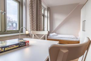 Posezení v ubytování Ferienhaussiedlung Strandperlen Buchenhof 2b (Typ VI)