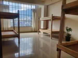 Postel nebo postele na pokoji v ubytování Mechüki Backpacker Hostel by trulynaga + 28 fotografií