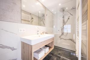 Koupelna v ubytování Appartements Schrambacherhof + 37 fotografií