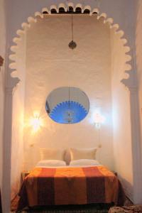 Postelja oz. postelje v sobi nastanitve Hotel Riad Dalia Tetouan