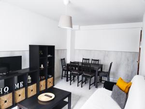 a living room with a couch and a table at CASA PURI in Candeleda