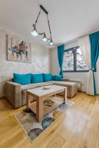 Predel za sedenje v nastanitvi NEO Apartman