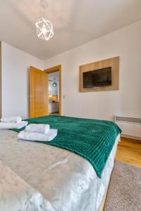 Postelja oz. postelje v sobi nastanitve NEO Apartman