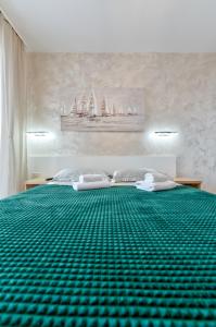 Postelja oz. postelje v sobi nastanitve NEO Apartman