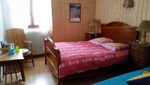 Postel nebo postele na pokoji v ubytování Le Castel Blanc