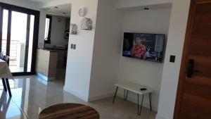 Departamento Mar del Plata a 50 mts de la playa TV 또는 엔터테인먼트 센터