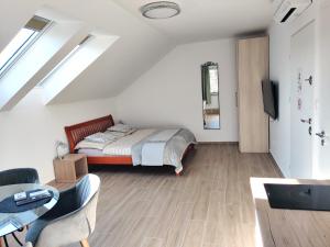 Postel nebo postele na pokoji v ubytování Dali Apartment Szentendre + 37 fotografií