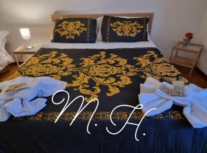 Łóżko lub łóżka w pokoju w obiekcie Mary House