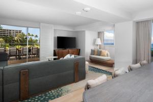 a living room with a couch and a dining room at The Westin Maui Resort & Spa, Ka'anapali in Lahaina