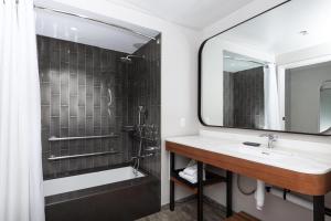 a bathroom with a sink and a mirror at The Westin Maui Resort & Spa, Ka'anapali in Lahaina