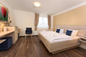 Letto o letti in una camera di Hotel Apollon Rust