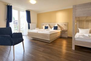 Un pat sau paturi într-o cameră la Hotel Apollon Rust