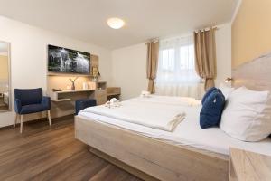 Letto o letti in una camera di Hotel Apollon Rust