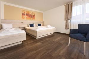 Letto o letti in una camera di Hotel Apollon Rust