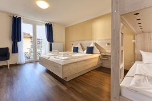 Letto o letti in una camera di Hotel Apollon Rust