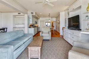 Et tv og/eller underholdning på Beach Front 3 Bedroom B