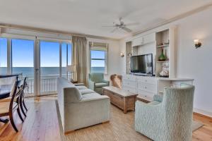 Et tv og/eller underholdning på Beach Front 3 Bedroom D