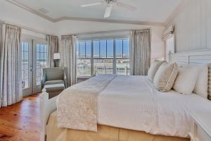 En eller flere senge i et værelse på Townhouse 3 Bedroom A