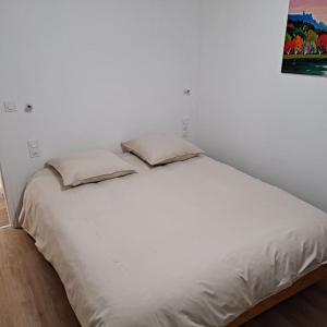 Posteľ alebo postele v izbe v ubytovaní Résidence La Mamone
