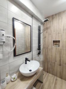 A bathroom at Syrtaki Hotel