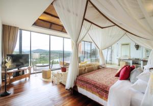 Cape Panwa Hotel Phuket客房内的一张或多张床位