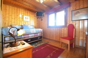 A bed or beds in a room at La Casita de Chocolate