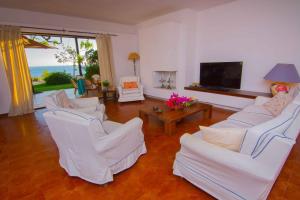 Un lugar para sentarse en Sunny Beach Villa