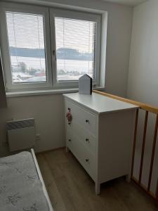 Postel nebo postele na pokoji v ubytování Útulný apartmán na Dolní Moravě