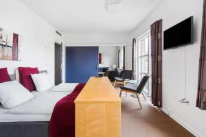 TV a/nebo společenská místnost v ubytování Best Western Hotel Hillerød