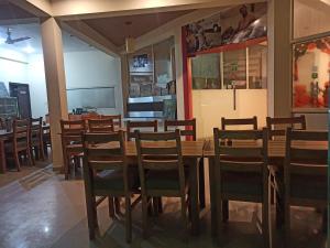 Restoranas ar kita vieta pavalgyti apgyvendinimo įstaigoje Dudhwa TigeRhino Resort