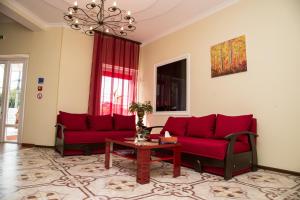 Posezení v ubytování 12 Months Mini Hotel