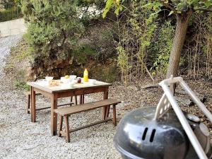 Vonkajšia záhrada v ubytovaní Maison Méditerranéenne 3 Pièces avec Jardin, Proche Plage – 6 Couchages, BBQ, Garage, Terrasse - FR-1-226B-134