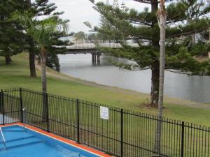a view of a body of water with a bridge at Le George Motel in Port Macquarie