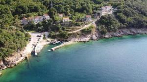 an aerial view of a beach and a body of water at Apartments Luki - great view in Smergo