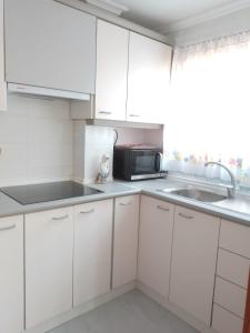 Kuchyň nebo kuchyňský kout v ubytování Sunshine Campello