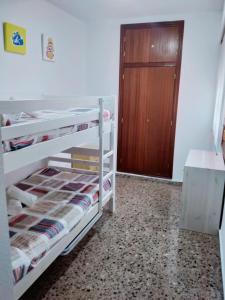 Postel nebo postele na pokoji v ubytování Sunshine Campello + 2 fotografie