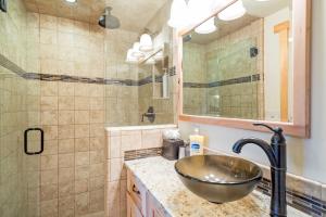a bathroom with a sink and a shower at Charming Studio w Kitchenette, Hot Tub Near River condo in Telluride +30 photos